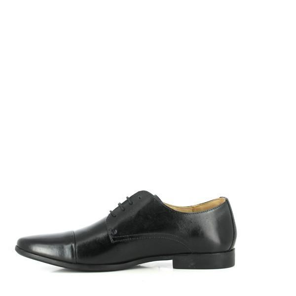 The back view of the Anatomic Amparo Black Oxfords illustrates the classic design with its neatly finished heel and smooth leather. The view highlights the refined, minimalist design of the heel and the clean lines that contribute to the shoe’s overall polished appearance.