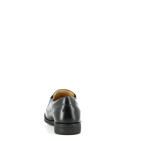 A close-up of the heel area, displaying the polished leather and the gentle taper of the shoe's back. The neat stitching and the subtle branding detail near the heel add to the refined aesthetic.