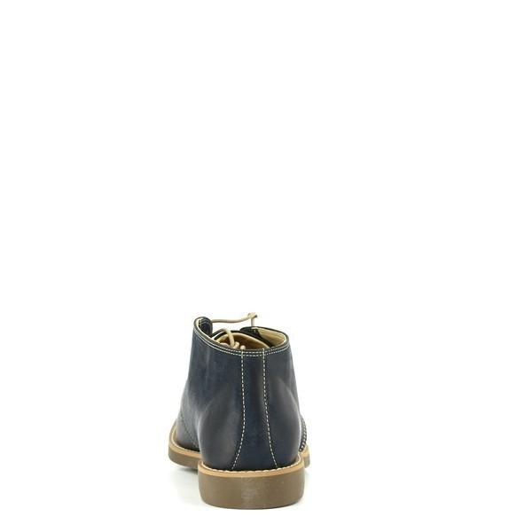 The back of the Anatomic Colorado Navy Lace-Up Boots highlights a clean, polished look with a smooth leather finish. The heel is subtly contoured, and the craftsmanship is evident in the soft leather welt that adds both style and durability.
