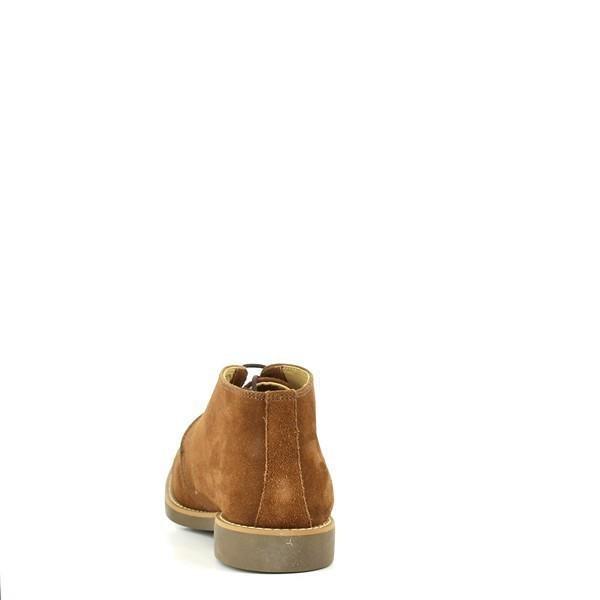 The back of the Anatomic Colorado Tobacco Lace-Up Boots features a clean, polished look with a smooth leather finish. The heel is contoured, and the craftsmanship is evident in the soft leather welt, which adds both style and durability.
