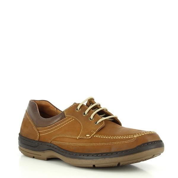 The angled side view accentuates the burnished leather, showcasing the shoe’s refined texture and elegant design. The slight curve and cushioned footbed are visible, emphasizing both comfort and style.