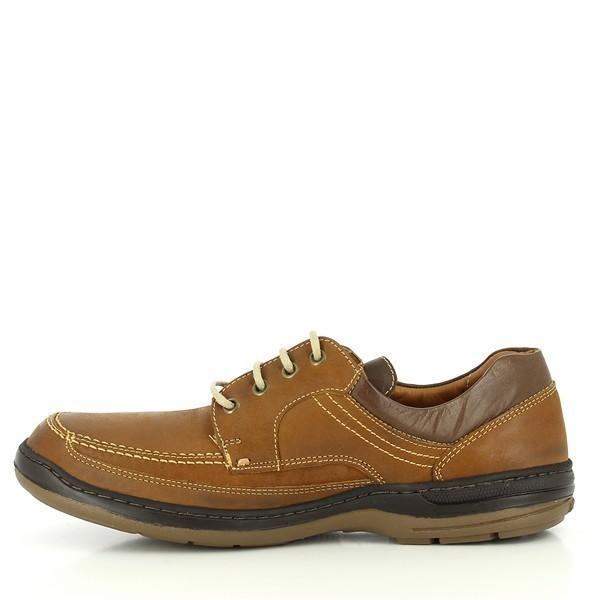 The internal side view reveals the plush sheepskin lining and cushioned footbed with dual layers of foam and latex. The antibacterial layer is visible beneath the footbed, ensuring breathability and freshness.
