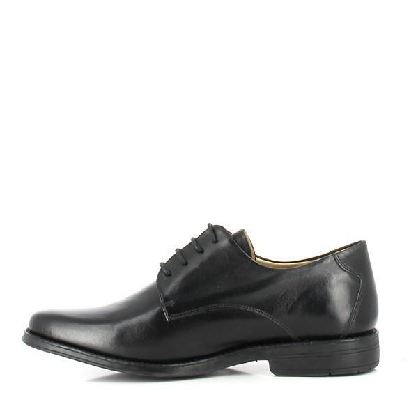 A close-up of the internal side of the Anatomic Leme Black Oxford Shoes, displaying the soft genuine sheepskin lining and cushioned footbed. This angle offers a view of the meticulous craftsmanship and attention to detail inside the shoe.
