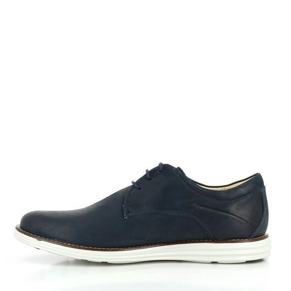 A close-up of the interior side of the Anatomic Planalto Navy Trainers, showing the genuine sheepskin lining and cushioned footbed. The image highlights the attention to detail and the high-quality materials used for ultimate comfort.