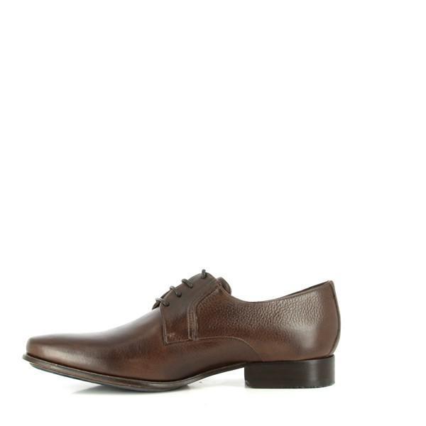 A detailed view of the inner side of the shoe, revealing the plush genuine sheepskin lining and cushioned footbed. The image shows the high-quality leather interior and the attention to detail in the shoe’s construction for maximum comfort.