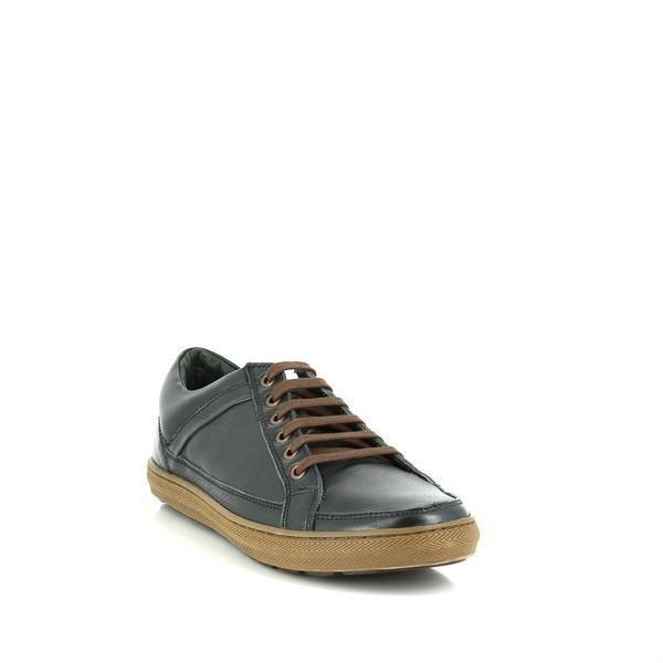 This angled view captures the shoe's depth and structure, emphasizing the rounded toe and comfortable fit. The subtle sheen of the leather and the precision of the craftsmanship are evident, offering a glimpse of the sneaker’s overall profile.