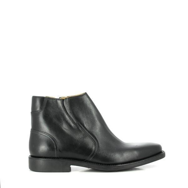 A sleek black leather ankle boot with a smooth, polished finish. The side shows minimal stitching, with a rounded toe and a subtle ankle height that defines the classic design. The sole is slightly elevated for comfort.