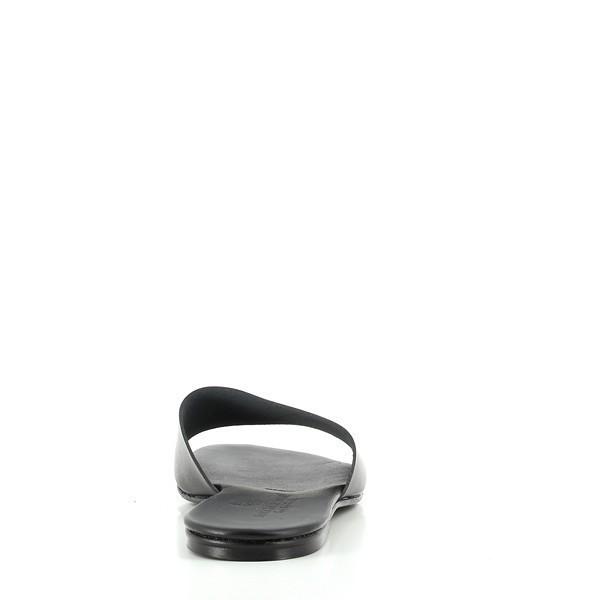 The back of the shoe presents a clean and elegant profile, with the heel height clearly visible. This perspective showcases the minimalist design, emphasizing its versatility for both casual and formal settings. The simplicity of the back enhances the overall charm of the slides, making them a timeless addition to any wardrobe.