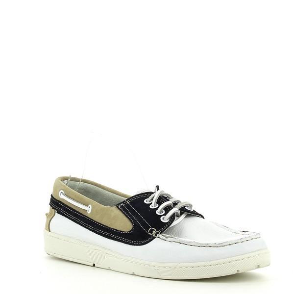A side-angle view that highlights the subtle curvature of the moccasin, revealing the well-crafted leather and the flexible rubber sole, perfect for both comfort and style.