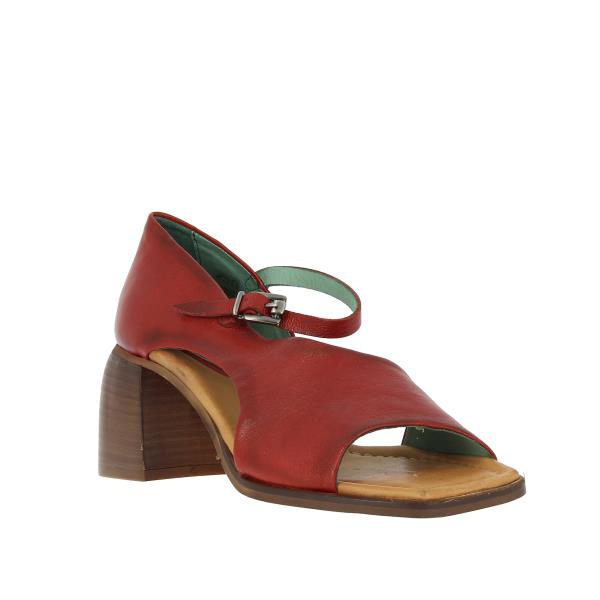An angled view of the sandals, highlighting the graceful curve of the heel and the open-toe design. The rich red leather stands out, with the side profile emphasizing the open sides and secure fit.