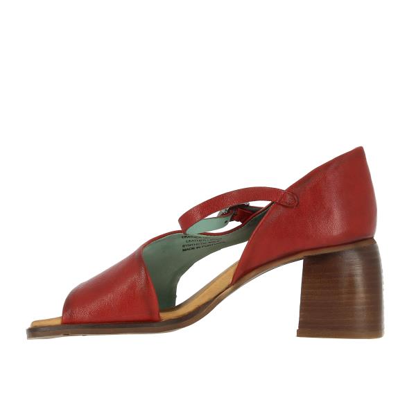 A view from the inner side of the sandals, showing the smooth leather lining and the structured heel. The open sides enhance the airy feel, while the buckle detail offers adjustable comfort.