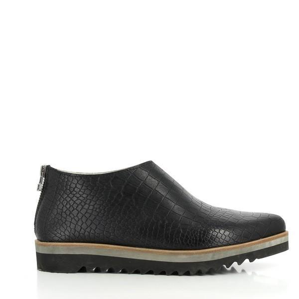 A sleek profile of the ankle boot showcasing the textured snake print leather, the clean lines of the flat sole, and the modern back zipper for added functionality.