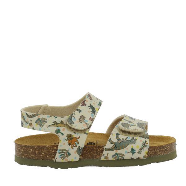 A captivating image of Plakton's 125459 Dinosaurs Kids Sandal displayed against a bright backdrop. The sandals feature charming dinosaur motifs on a white leather upper, with adjustable Velcro straps ensuring a secure fit. The cork footbed and ridged sole offer comfort and stability, perfect for young adventurers exploring the world around them.