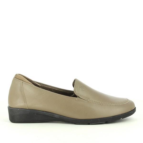 A pair of 24 Hrs 21052 Taupe Slip On Shoes, featuring a sleek taupe leather upper. The shoes are designed with a classic round toe, soft leather lining for added comfort, and a durable synthetic sole with a 3 cm heel-platform height. Displayed against a neutral backdrop, the shoes emphasize their elegant design and superior craftsmanship.