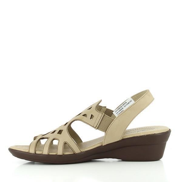 The inside view reveals the soft leather lining, designed for maximum comfort and breathability. The seamless construction and elegant front design are evident, reflecting the meticulous craftsmanship. The ergonomic footbed is subtly shown, emphasizing the sandal's focus on comfort.