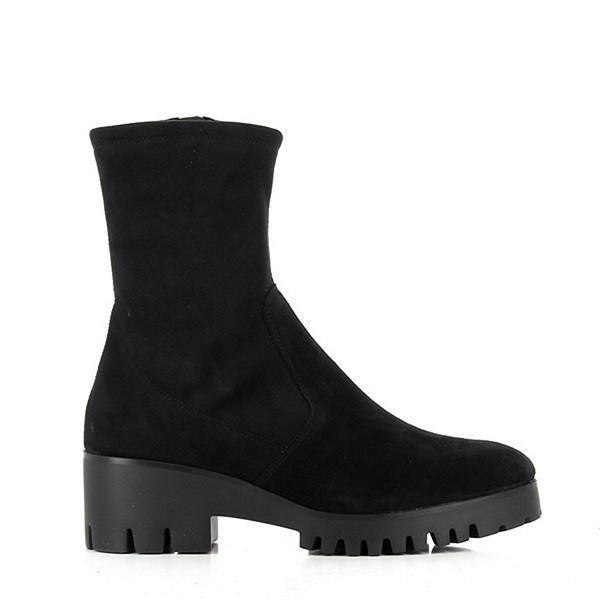 The 24HRS 23854 Black Ankle Boots feature a sleek black leather upper with a refined round toe. The 5 cm heel-platform adds a subtle elevation, enhancing both style and comfort. An internal zipper ensures easy access, while the leather lining and synthetic sole offer durability and comfort. Made in Spain, these boots combine classic design with expert craftsmanship.