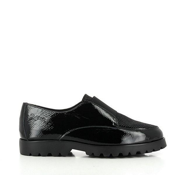 A pair of 24HRS 24230 Black Slide-On Shoes displayed from a slightly angled view, showcasing the smooth black leather upper and classic round toe design. The image highlights the 2 cm heel and the sleek, minimalist silhouette, emphasizing the elegant and versatile nature of these women’s shoes.