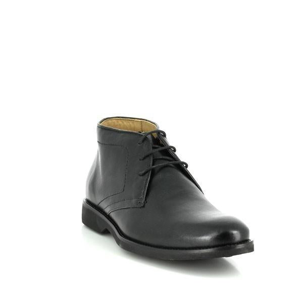 This angled shot of the Anatomic Barium Black Ankle Boot highlights its sleek profile and smooth leather upper. The photograph emphasizes the boot’s elegant design and refined stitching, showcasing the sophisticated craftsmanship and the rich, black leather texture.

