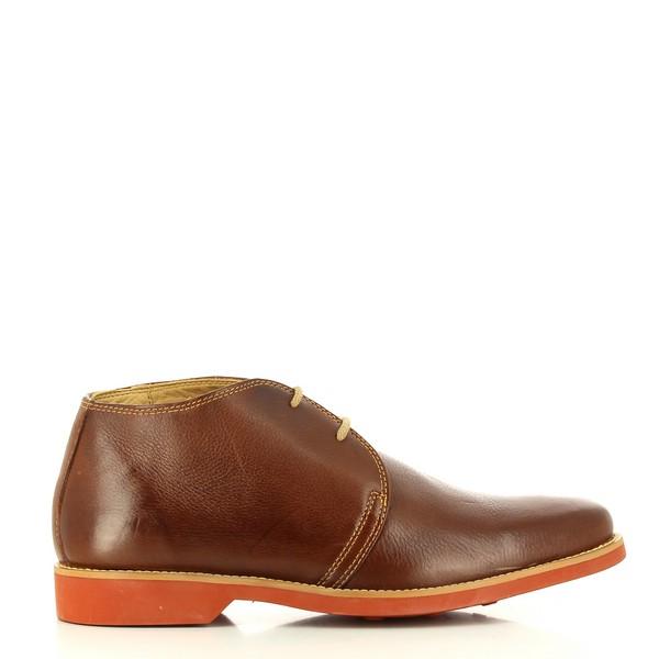 The Anatomic Colorado Pinhao Lace-Up Boots are showcased from the side, highlighting their rich Pinhao leather upper with a smooth, burnished finish. The classic round toe and elegant lace-up design are clearly visible.

