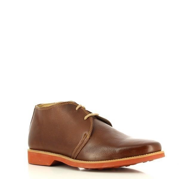  Presented from a slight angle, the boots reveal their sophisticated profile and the luxurious texture of the leather. The cushioned footbed is subtly suggested, emphasizing the comfort and support features.