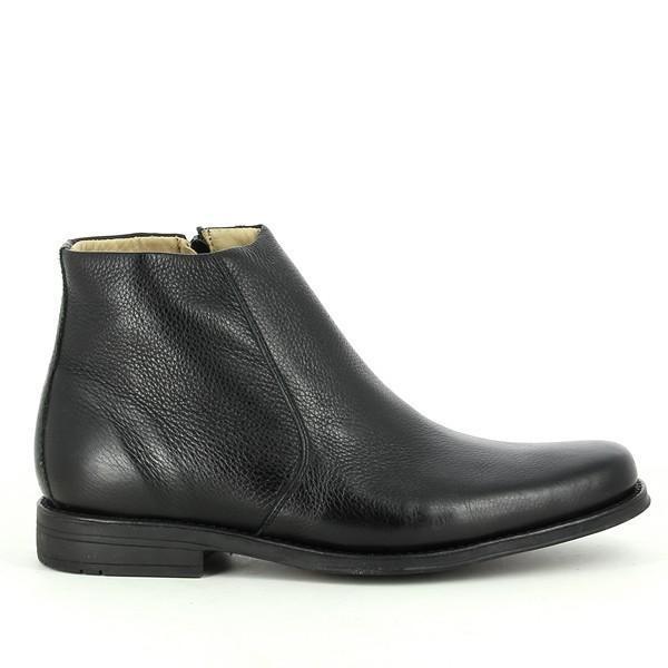 A sleek side profile of the Anatomic Franco Black Ankle Boots, showcasing their smooth, full-grain leather upper and stylish round toe. The ankle-high design and subtle stitching details highlight the boot’s elegant silhouette.