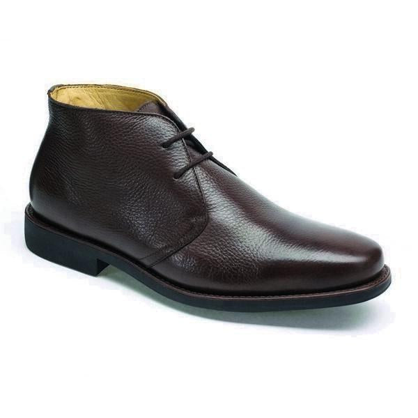 An angled shot showcasing the sleek contours of the shoe, emphasizing the round toe and premium leather construction. The slight sheen of the burnished leather and the detailed stitching highlight the craftsmanship and durability.