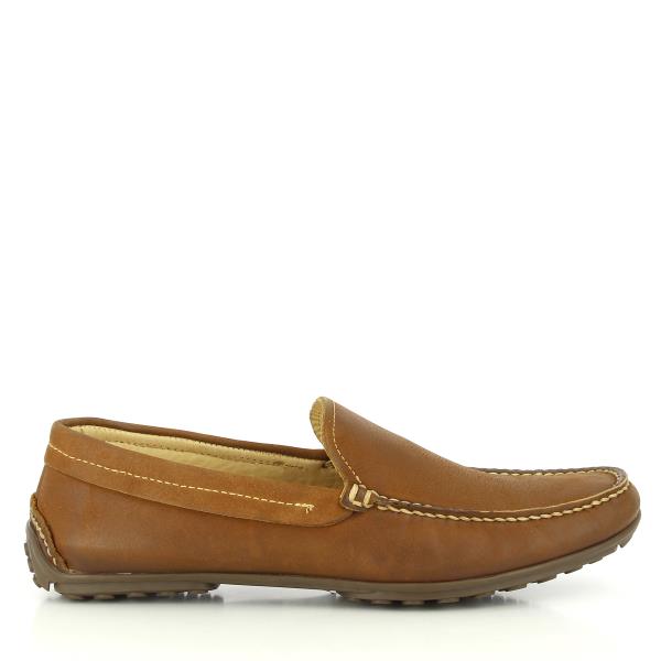 A side view of the Anatomic Lucas Cognac Boat Shoes, highlighting the rich cognac leather upper with its smooth finish. The classic boat shoe silhouette is clearly visible, featuring detailed stitching and a rounded toe for a refined look.