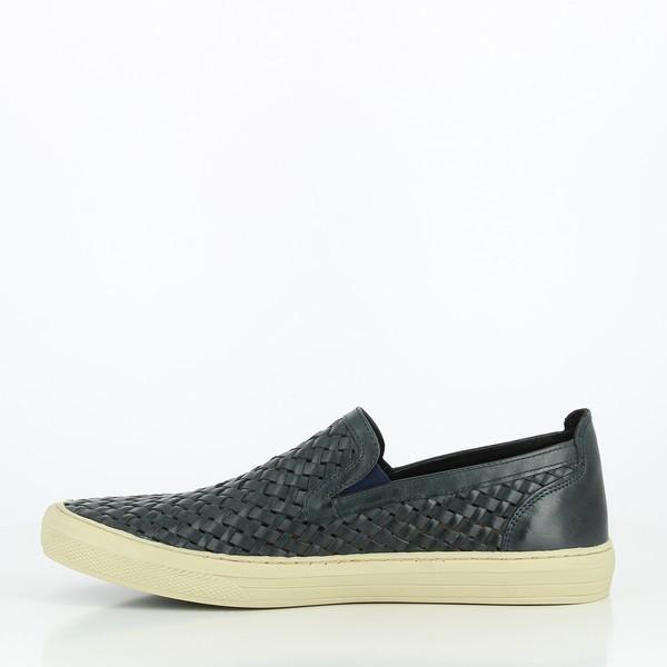 The internal side shows the shoe's soft leather lining, with a smooth, uninterrupted surface that offers comfort. The footbed appears cushioned for extra support.

