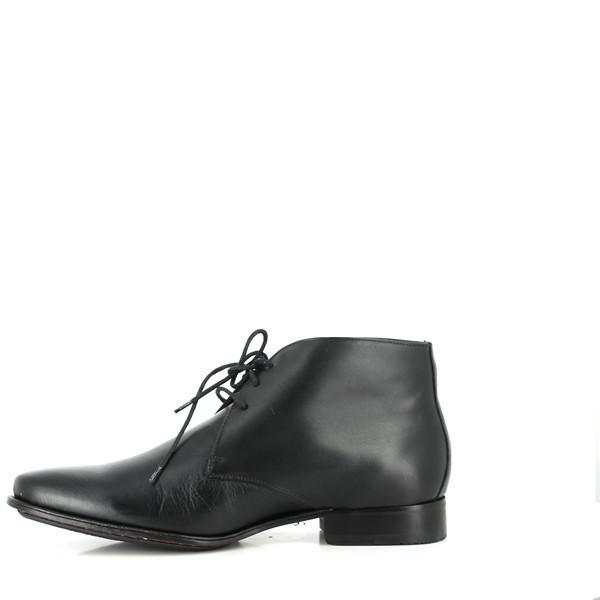The internal side view of the Anatomic Panorama boots reveals the luxurious genuine sheepskin lining and cushioned footbed. This angle emphasizes the attention to comfort with a focus on the antibacterial layer and the premium leather lining designed to keep feet cool and dry.

