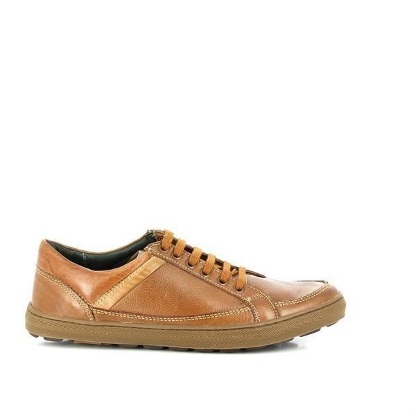 The Anatomic Serra Cognac Sneaker is shown from the side, highlighting its sleek, rounded toe, smooth cognac leather upper, and minimalistic design. The profile reveals the clean lines and premium craftsmanship of the sneaker.