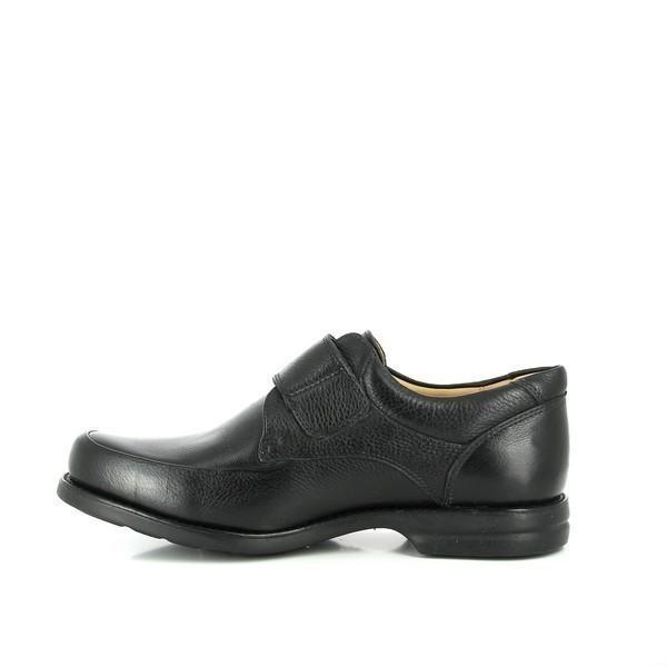 This perspective shows the interior lining of the shoe, crafted from soft sheepskin for maximum comfort. The inside structure reveals the cushioning that contours to the foot, offering a supportive feel.