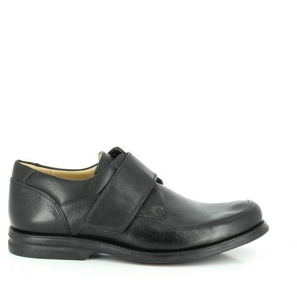 A sleek, polished black leather Oxford shoe with a round toe and a smooth upper. The Velcro strap is visible across the top for easy fastening. The slightly raised heel and cushioned footbed are also subtly noticeable.