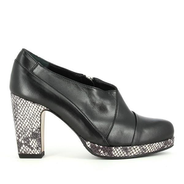 The Audley 18555 Black Snake Print High Heel Booties showcase a sleek and sophisticated silhouette, with a polished black leather upper complemented by a striking snake print detail on the heel. The round toe design adds an elegant touch, making them perfect for any occasion.