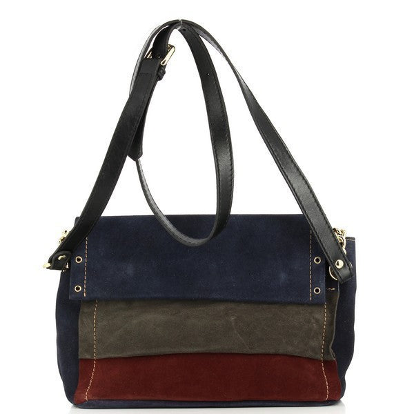 The photo showcases the Bridas 1921 Navy & Brown Crossbody Bag, elegantly designed with a rich navy leather exterior complemented by warm brown accents. The bag features a sleek silhouette with an adjustable strap, allowing for comfortable wear. Its detailed craftsmanship is evident in the quality stitching and unique design elements, making it a perfect choice for stylish women’s accessories. The interior is lined with a soft material, providing a chic yet functional space for essentials. 