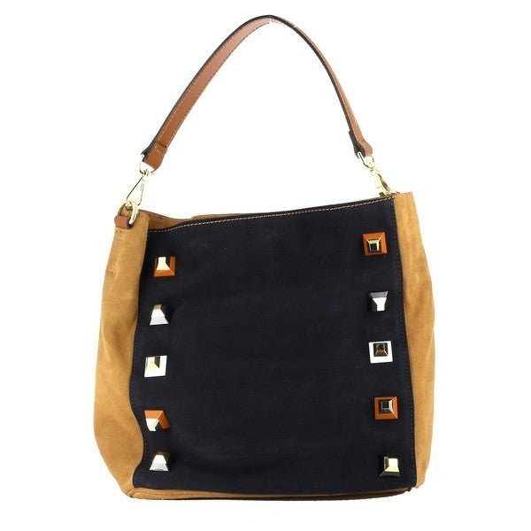 The front view of the Bridas 287 Black & Tan Shoulder Bag highlights its striking design, featuring elegant black leather complemented by decorative stud details. The studs add a touch of modern flair, creating an eye-catching contrast against the smooth leather, showcasing the bag’s artisanal craftsmanship.