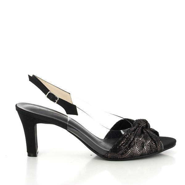 The side view of the Dalessi Dabb Metallic Black Slingback Heel highlights its sleek, metallic black finish. The transparent panel on the side adds a modern, airy detail that contrasts beautifully with the shimmering upper. The 6.5 cm heel is visible, offering a graceful lift with a balanced silhouette.