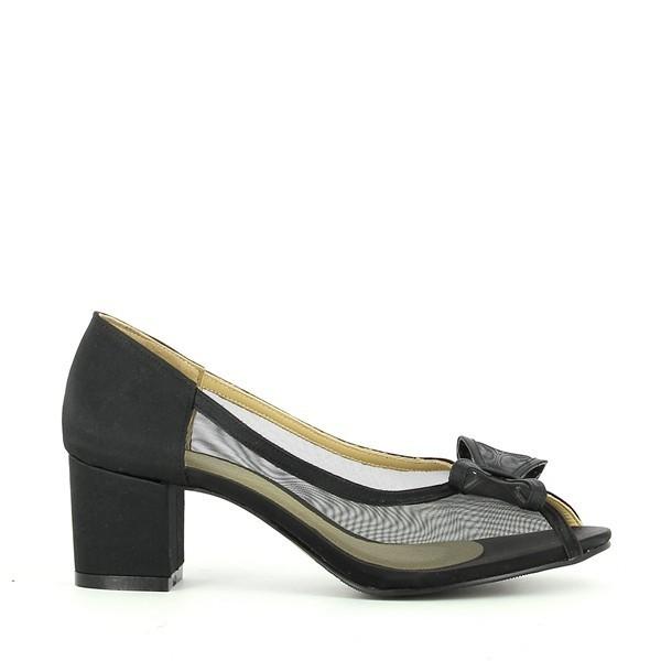 The sleek side profile of the Dalessi Dansk Black Heeled Pumps showcases the smooth leather upper, subtly curving to form a polished and refined silhouette. The elegant 5.5 cm heel is perfectly proportioned, offering both style and comfort.