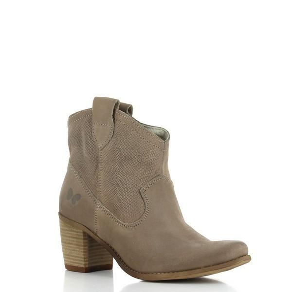 An angled side view of the boot that captures its distinct handcrafted design, with subtle stitching details and the slightly curved heel. The taupe leather displays its natural texture, adding a touch of rustic sophistication.