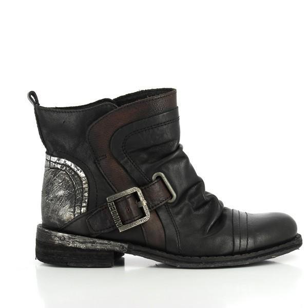 The side profile of the Felmini 8563 Black & Brown Ankle Boots highlights the clean lines and contrasting leather tones. The decorative buckle detail stands out, adding a modern touch, while the 2 cm heel provides a subtle yet stylish lift.