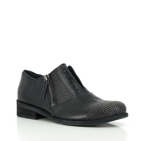 From this angle, the Felmini 9036 Blue Slip-On Shoes show off their clean lines and the slight curve of the heel. The slip-on construction is highlighted, providing a casual yet refined silhouette. The soft blue leather adds a touch of color, while the overall design maintains a sophisticated and versatile appearance.