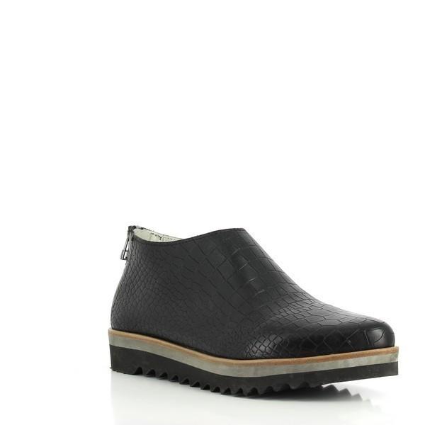 A dynamic perspective capturing the snake print's intricate details, the sturdy sole construction, and the stylish balance between the boot's height and rounded toe.