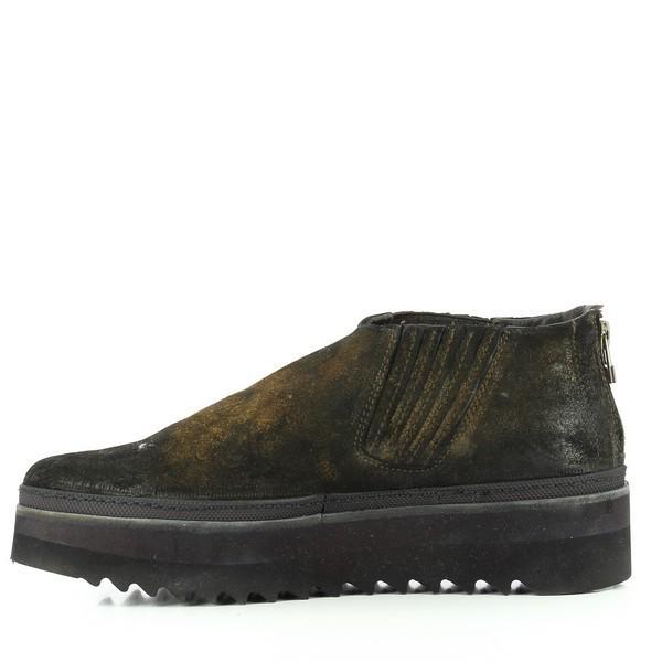 The inside of the boot is shown with its luxurious leather lining and the functional back zipper, adding convenience and comfort. The dark brown suede contrasts with the smooth interior, showcasing the high-quality materials used.