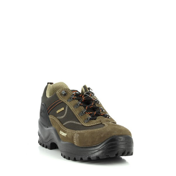 A dynamic shot capturing the sneaker from a slightly angled perspective, highlighting its ergonomic shape, reinforced stitching, and cushioned heel for support.