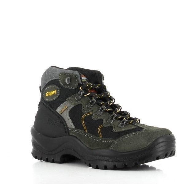 A slightly angled shot emphasizing the boot’s rugged design, textured outsole for superior grip, and reinforced heel support. The taupe suede finish enhances its stylish yet functional appeal.