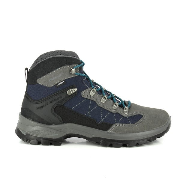 This image highlights the Grisport 14509D5G Grey Trekking Sneakers from the side, showcasing the clean lines of the leather upper. The durable synthetic sole with a rugged tread is visible, designed for reliable traction in outdoor environments. The round toe shape adds to the sneaker’s stylish yet functional look, providing a comfortable fit for all-day wear.