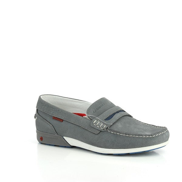 A three-quarter angle of the shoe, highlighting its refined silhouette, slip-on design, and the slight elevation of the 2.5 cm heel for added support.