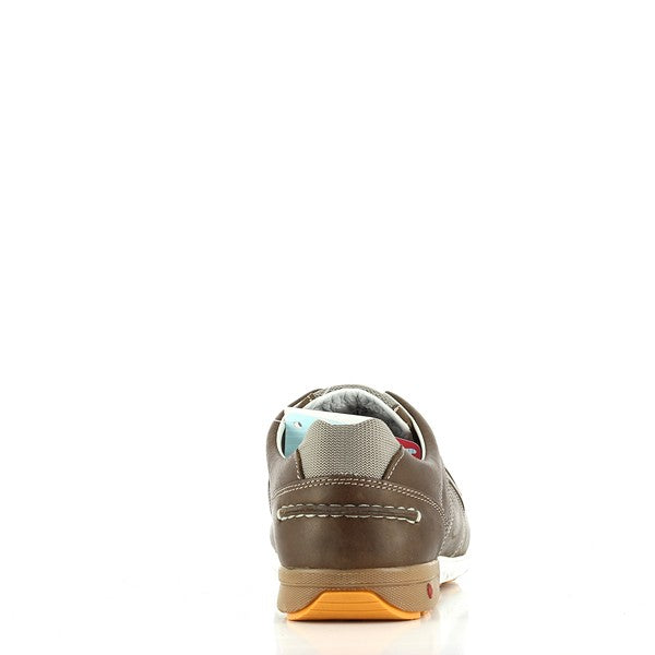 A rear perspective focusing on the heel counter, the 2.5 cm heel for added support, and the sturdy synthetic outsole for grip and stability.