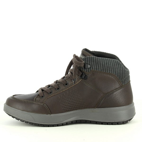 A close-up of the inner side of the boot, showing the soft leather and synthetic lining for enhanced comfort and breathability.
