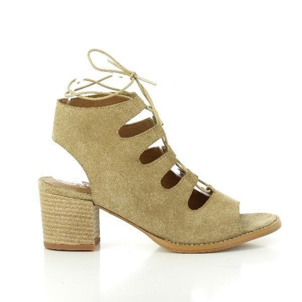 A side profile of the Igualados 6517 Beige Lace-Up Booties, showcasing the sleek leather upper, lace-up design, and open ankle feature that gives it a modern edge.