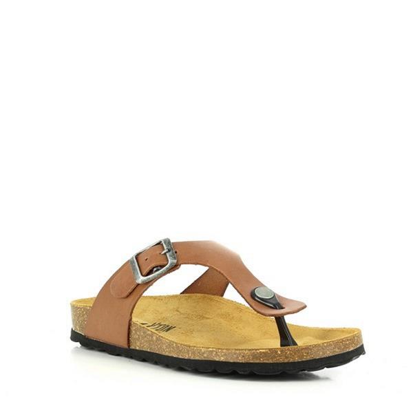  The image showcases Plakton's 101671 Brown Thong Sandals, a symbol of timeless elegance and sustainable fashion. Crafted in Spain, these sandals feature a classic thong design with an adjustable buckle for a customized fit. The cork sole molds to the feet, providing optimal support and cushioning, while the anti-bacterial insole ensures freshness all day. Perfect for those with broader feet, these sandals offer both style and comfort. Step into Plakton's Sandals and embrace ethical fashion with every step.